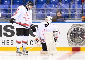 SOCHI, RUSSIA - APRIL 19: Switzerland's Patrik Brandli #11 is chatting with his teammate prior to preliminary round action against Slovakia at the 2013 IIHF Ice Hockey U18 World Championship. (Photo by Matthew Murnaghan/HHOF-IIHF Images)